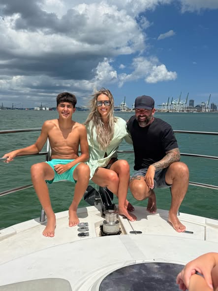 Kerry Barclay with family on the water